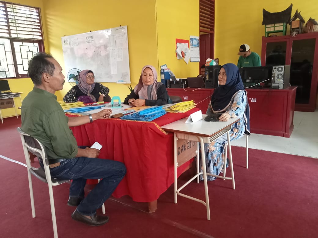 Monitoring dan Evaluasi Layanan Perpustakaan Keliling di UPT SMPN 1 Silaut