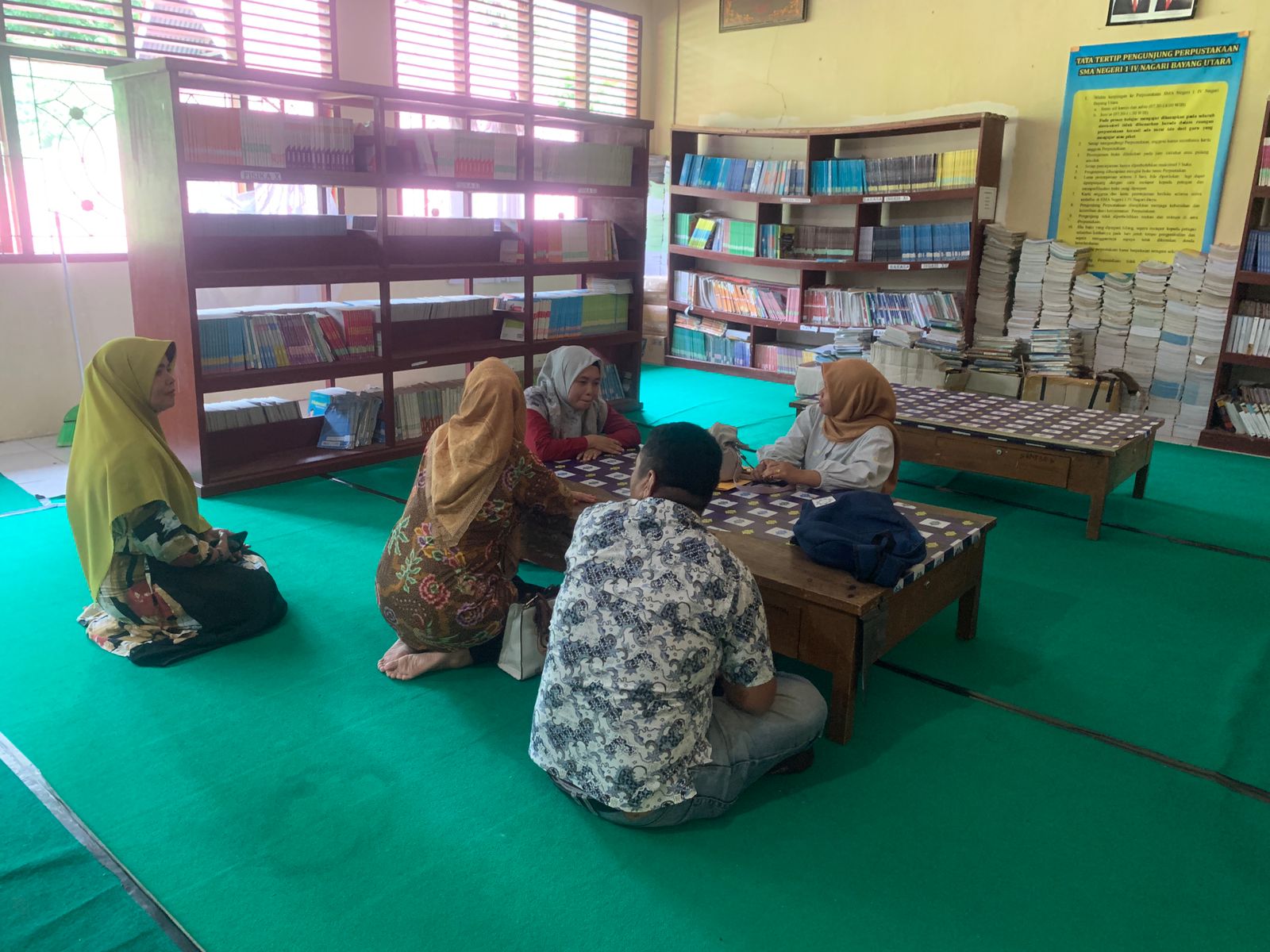 Monitoring dan Evaluasi Layanan Perpustakaan Keliling di SMAN 1 Bayang Utara