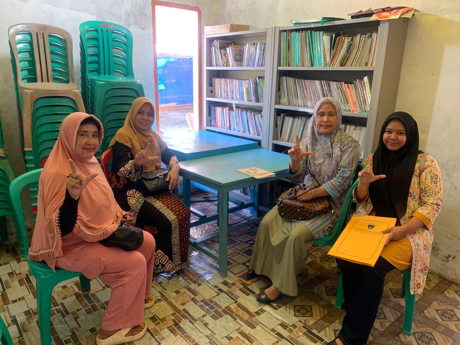 Pembinaan dan Monitoring di TBM Dwi Lestari Collage 