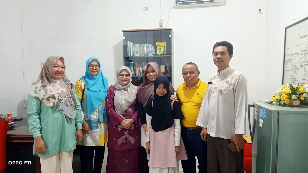 Sharing Informasi mengenai Pengelolaan Kearsipan ke Dispuker Kota Padang